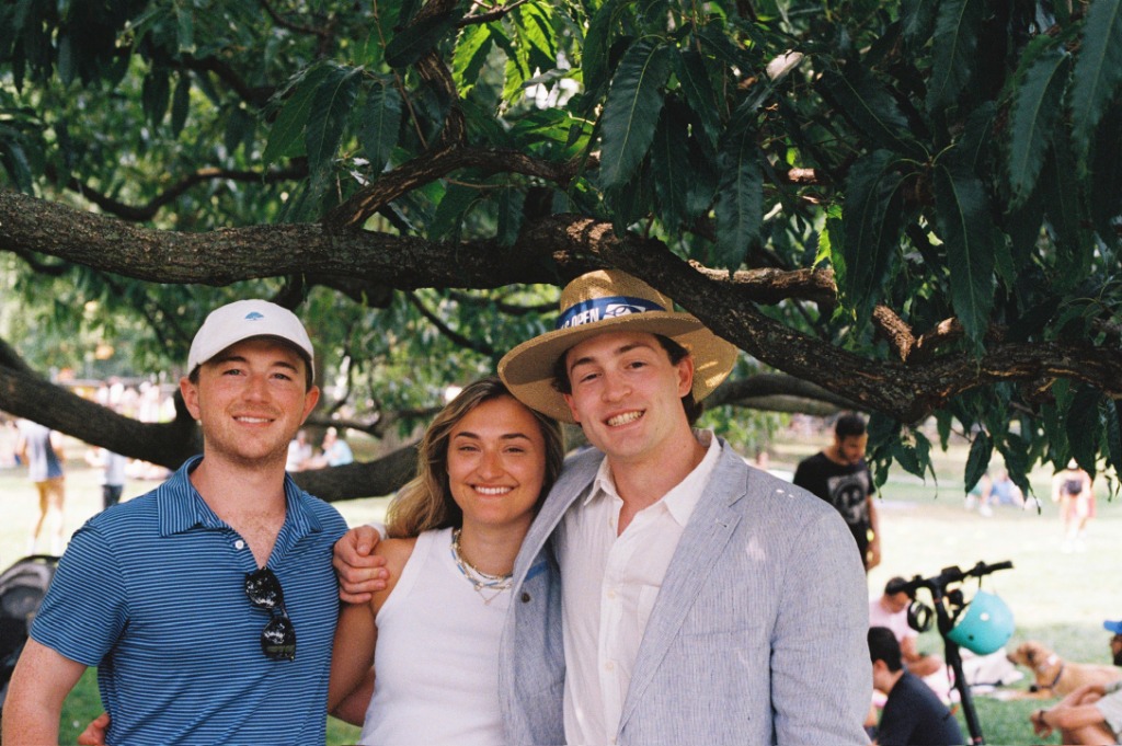 Friends laughing at a picnic